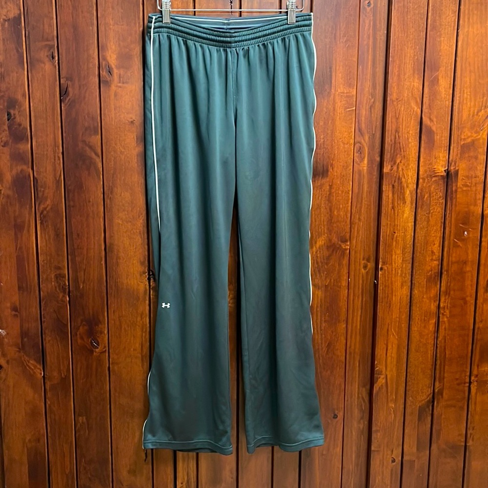 Under Armour semi fitted pants. Gray in color with white stripe.